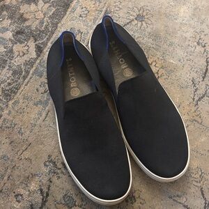 Rothy's Black Slip-On Loafers with Blue Trim